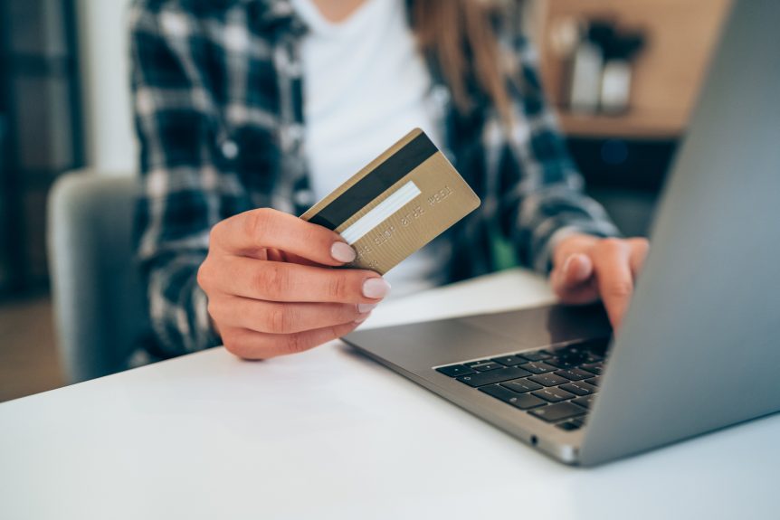 Woman Using an Online Booking System
