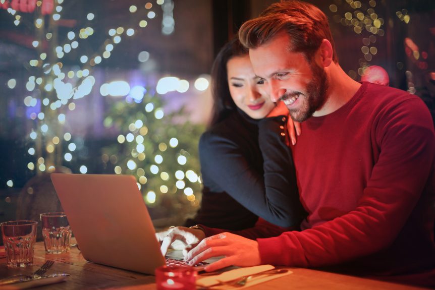couple looking at laptop